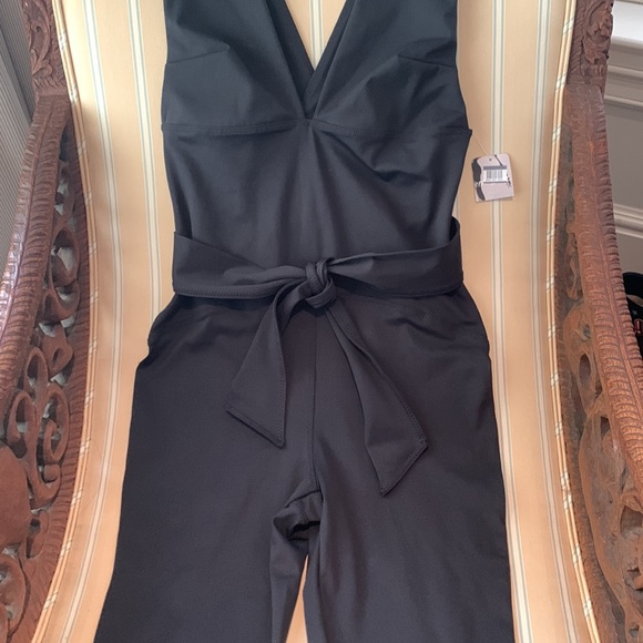 FREE PEOPLE MOVEMENT AFTER HOURS PLUNGE NECK JUMPSUIT IN BLACK SIZE MEDIUM - Picture 11 of 16